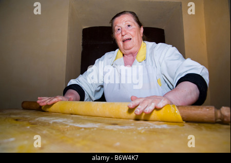 Woman preparing handmade pasta. Stock Photo