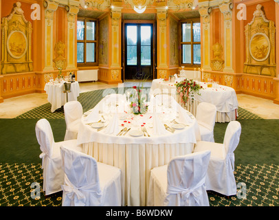 Tables ready for a formal dinner Stock Photo