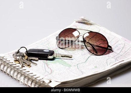 Keys and sunglasses on page of Thomas guide map of Los Angeles Stock Photo