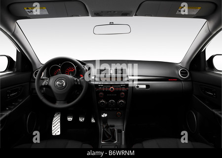 2009 Mazda MAZDASPEED3 Sport in White - Dashboard, center console, gear shifter view Stock Photo