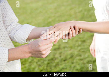 Couple getting married outdoors Stock Photo