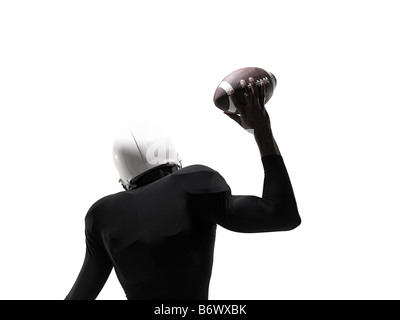 An american football player holding a football Stock Photo