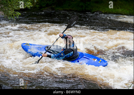 Wales, Gwynedd, Bala. White water kayaking on the Tryweryn River at the National Whitewater Centre Stock Photo