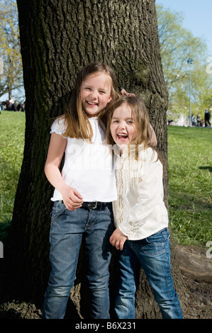 Sisters standing together Stock Photo