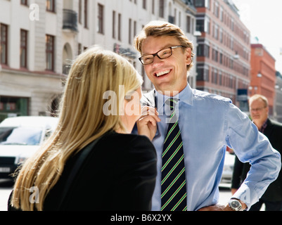 laughing businessman with woman Stock Photo