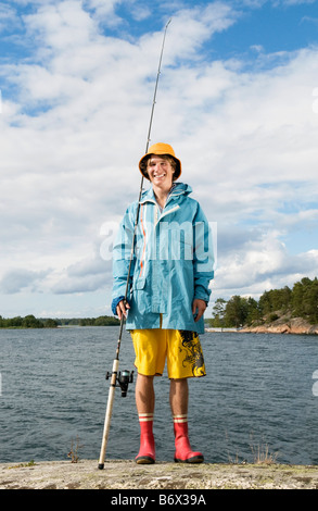 Guy in rain cloths Stock Photo