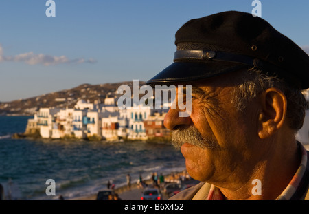 Mykonos Greece local man with fishing hat portrait with old greek