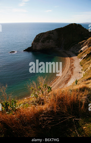 View over Man O'War Bay from cliff tops above Durdle Door on Dorset's Jurassic Coast near Lulworth Cove Stock Photo