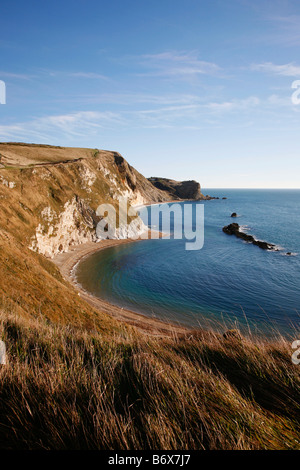View over Man O'War Bay from cliff tops above Durdle Door on Dorset's Jurassic Coast near Lulworth Cove Stock Photo