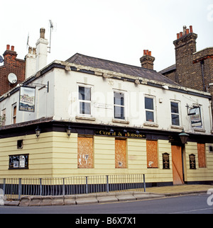 Boarded up Coach and Horses pub on St James's Street in Walthamstow London England UK Stock Photo