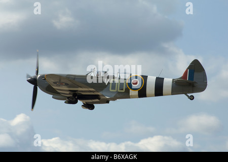 An British RAF Spitfire training fighter in flight Stock Photo