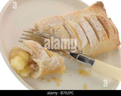 Freshly Baked Apple Strudel Pastry Dessert Isolated Against A White Background With No People and A Clipping Path Stock Photo