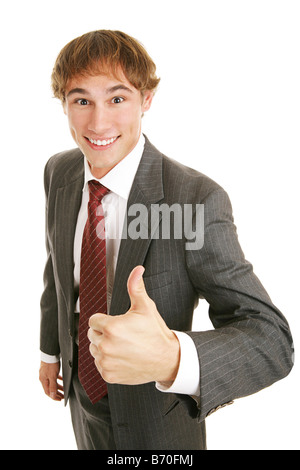 Handsome young businessman giving an enthusiastic thumbs up Isolated on white Stock Photo