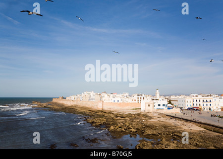 Essaouira Morocco North Africa View along seafront to white buildings in 18th century town Medina Stock Photo