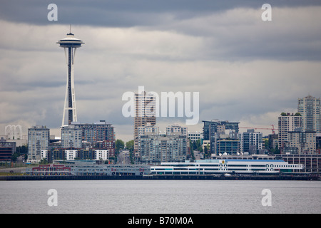 Downtown Seattle Washington skyline on a typical cloudy day from Elliot Bay in Puget Sound Stock Photo