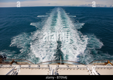 Wake behind Celebrity Cruise Lines Infinity ship sailing the Inside Passage from Seattle to Alaska Stock Photo