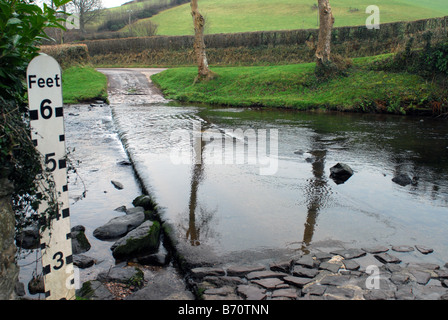 Badgworthy water and Ford and depth pole at Malmsmead in the Doone Valley Exmoor National Park Stock Photo