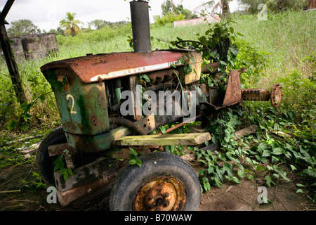 Suriname, Paramaribo, Restored plantation called Frederiksdorp at the Commewijne river. Old tractor. Stock Photo