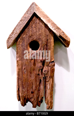 Old nesting box on the wall Stock Photo