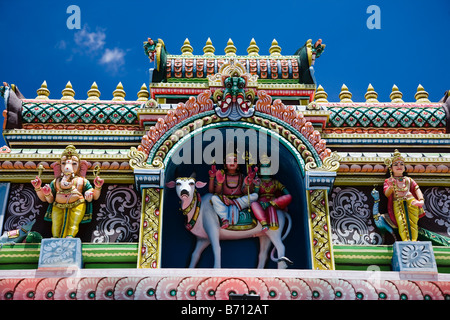 Detail from roof of Hindu Temple near Grande Baie in Mauritius with sacred cow and god called Lord Ganesh Ganpati Stock Photo