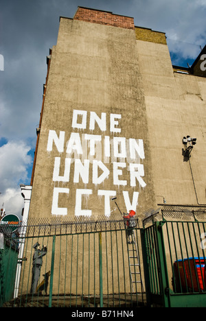 One Nation Under CCTV graffiti by Banksy. Newman Street, London, W1 ...