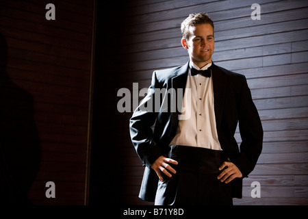 Young groom posing in tuxedo Stock Photo