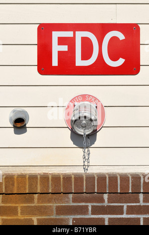 Building FDC Fire Department Connection for sprinkler system Stock Photo