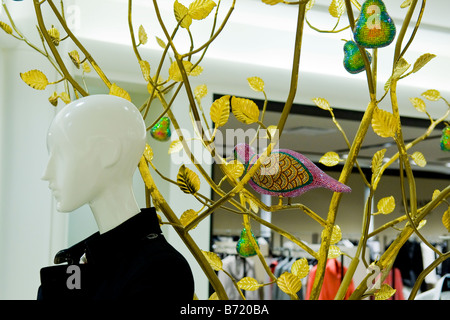 Gardens Shopping Mall or center Xmas decorations in department store with a partridge in a pear tree by mannequins Stock Photo