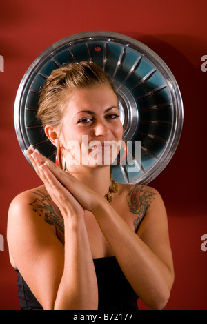 Woman with tattooed shoulders Stock Photo