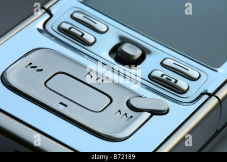 Portable mp3 media player and phone Stock Photo