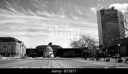 The Hall of Memory (centre) with Baskerville House and the Flame of Hope left, Alpha Tower right, from Centenary Square. Stock Photo