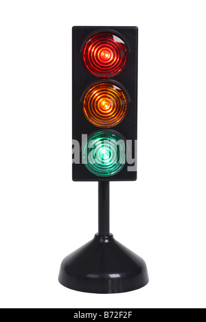 Small traffic light cut out on white background Stock Photo