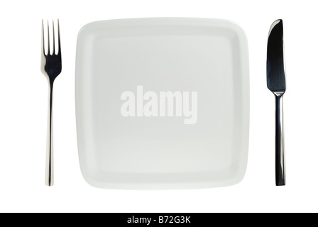 trendy isolated white plate with knife and fork Stock Photo