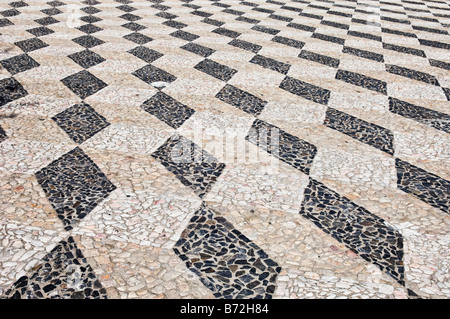 Nice geometric decorative stone pavement traditional from Portugal Stock Photo