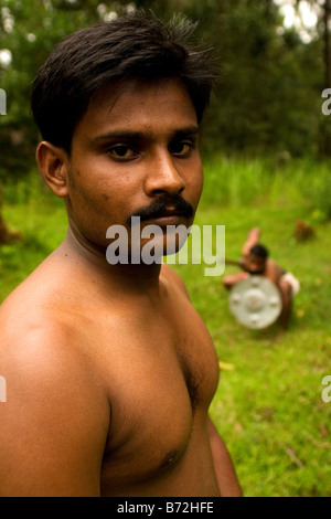 A proponent of Kalarippayattu in Ernakulam, in Kerala, India. Kalarippayattu is a form of martial art. Stock Photo