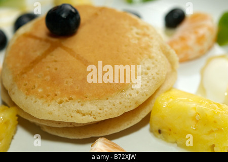 A healthy breakfast of fruit and pancakes Stock Photo