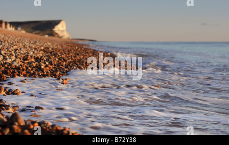 Seaford beach in East Sussex with Seaford Head in the distance. Picture by Jim Holden. Stock Photo