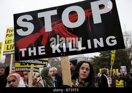 Pro-Palestine supporter holding Stop the Killing sign - USA