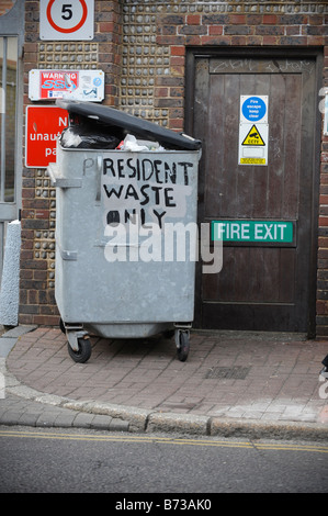 A residents' waste bin with a 'p' added to read 'president waste only' on the side. Picture by Jim Holden. Stock Photo