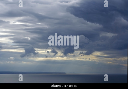 Dramatic sky over sea in mid-Wales, Ceredigion, Aberystwyth, UK, Stock Photo