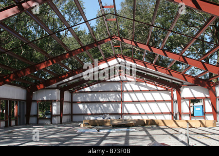 A steel framed building under construction Large depth of field with focus on roof beams Stock Photo