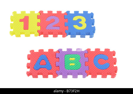 Colorful puzzle blocks with 123 and ABC arranged on white background Stock Photo