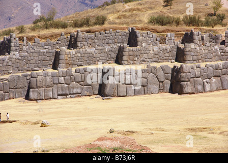 Massive stone walls in Inca fortress walls Sacsayhuaman Cusco Peru South America Stock Photo