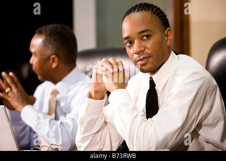 Two African-American businessmen in conference room Stock Photo