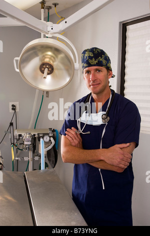 Portrait of veterinarian standing in empty examination or operating room Stock Photo