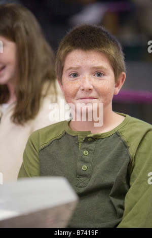 Portrait of happy Caucasian pre-teen boy with freckles Stock Photo