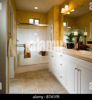 Small traditional bathroom with glass shower Stock Photo