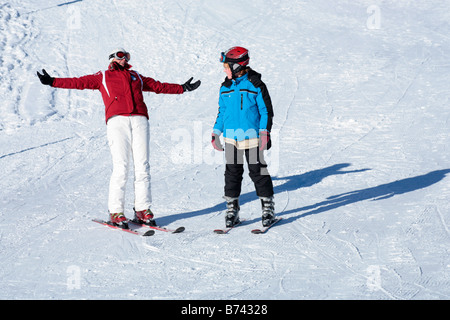 a young boy getting skiing lessons at mountain station Gamsgarten at Stubai Glacier in Tyrol, Austria Stock Photo