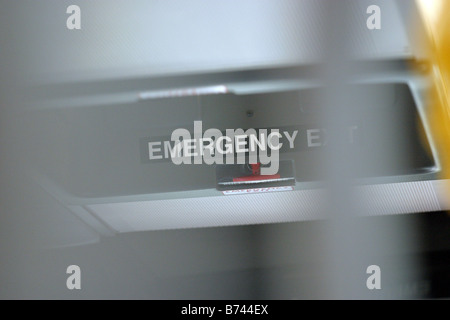 Emergency exit sign  in a bendy bus Stock Photo