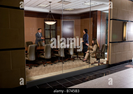 Multi-racial business people meeting in conference room Stock Photo